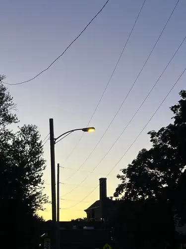 That quiet moment when the streetlights come alive.